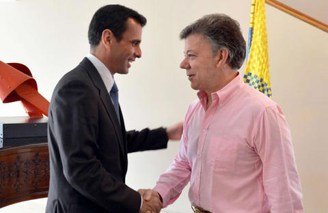 Manuel-Santos y Henrique Capriles